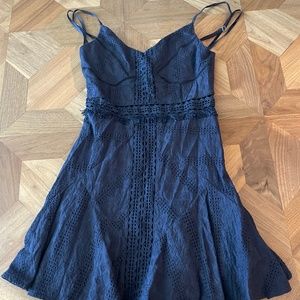 Saints + Secrets dark blue mid thigh length fit and flare sundress